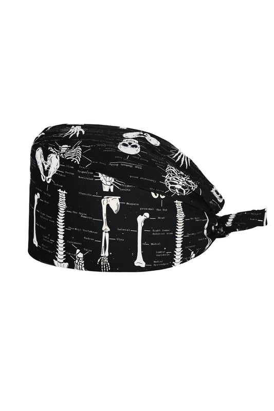 OP-Haube aus Stoff mit Muster – Schwarz mit anatomischem Skelettmotiv