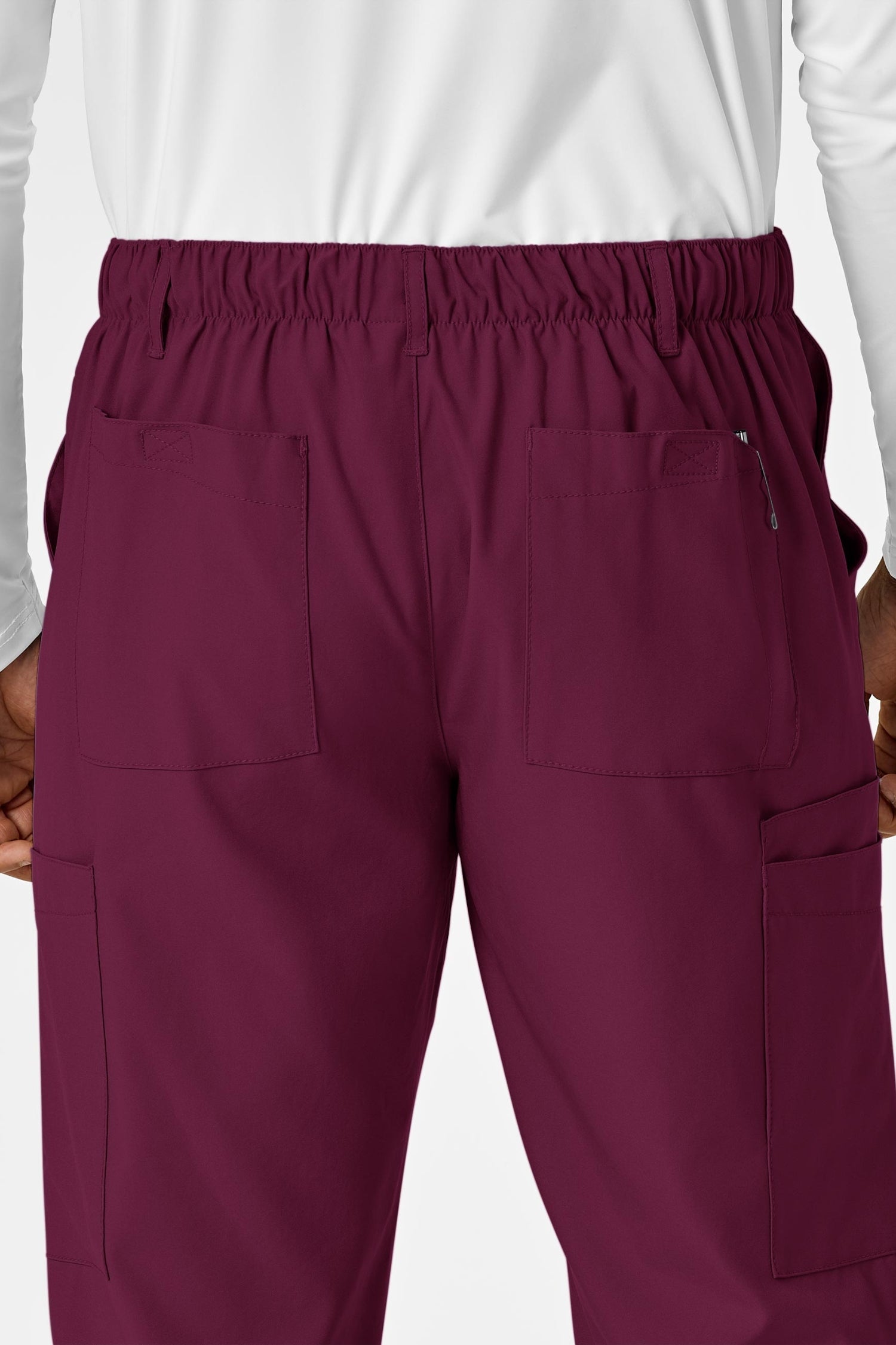 Pantalon médical bordeaux avec Größe élastique et poches cargo pour tenue médicale complète