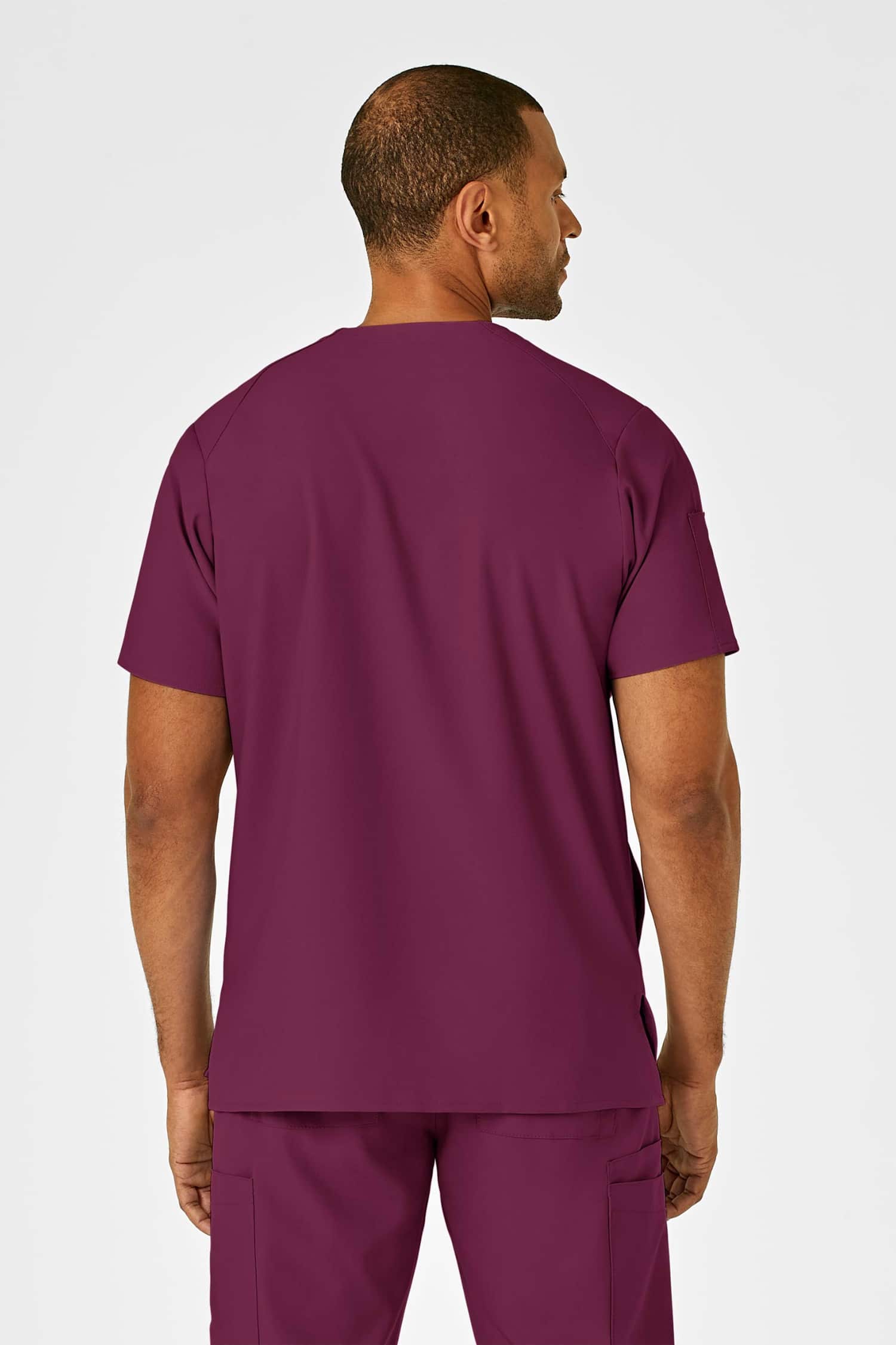 Vue arrière d’un haut de scrubs médicaux violets de tenue médicale complète W123